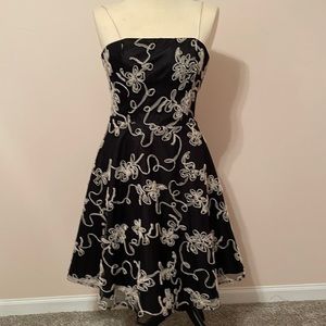 Skinny strap baby doll lace dress.